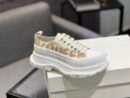 Alexander McQueen Tread Slick in White with Gold Accents