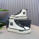 Amiri Canvas High-Top Sneakers in White with Black Accents