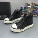 Amiri High-Top Sneakers in Black with White Sole.