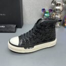 Amiri High-Top Sneakers in Black with White Sole.