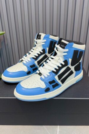 Amiri High-Top Sneakers in Blue, White, and Black.