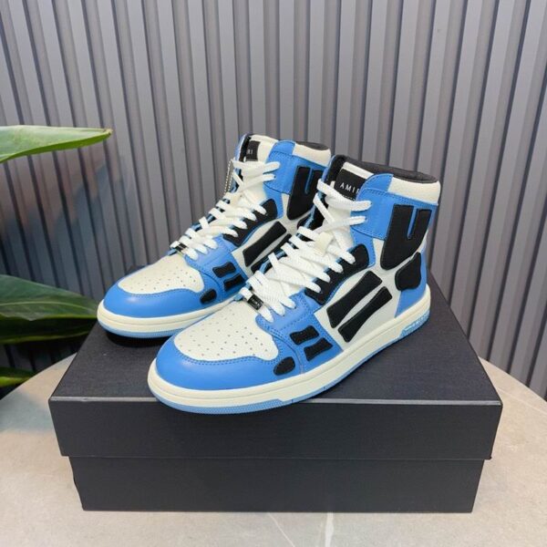 Amiri High-Top Sneakers in Blue, White, and Black.