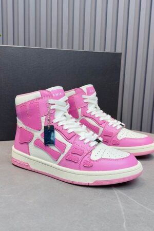 Amiri High-Top Sneakers in Pink and White.