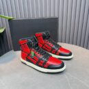 Amiri High-Top Sneakers in Red and Black with White Sole.