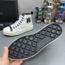 Amiri High-Top Sneakers in White with Black Logo