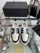 Amiri MA-1 Lace-Up Sneakers in Black and White Leather