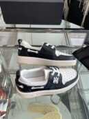 Amiri MA-1 Lace-Up Sneakers in Black and White Leather