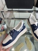 Amiri MA-1 Lace-Up Sneakers in Navy Blue and White Leather
