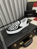 Amiri Skel Toe Slip-On Canvas Sneakers in Black and White