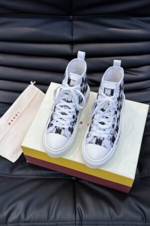 Amiri Skel Top High-Top Sneakers in Black and White.