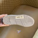 Amiri Skel Top High-Top Sneakers in Grey and White.