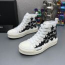 Amiri Skel Top High-Top Sneakers in White with Black Stars.
