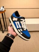 Amiri Skel-Top Low-Top Sneakers in Blue and Black.