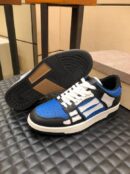 Amiri Skel-Top Low-Top Sneakers in Blue and Black.