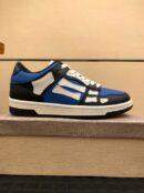 Amiri Skel-Top Low-Top Sneakers in Blue and Black.