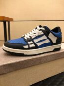 Amiri Skel-Top Low-Top Sneakers in Blue and Black.
