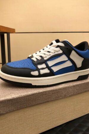 Amiri Skel-Top Low-Top Sneakers in Blue and Black.
