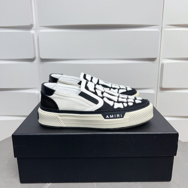 Amiri Skel-Top Slip-On Sneakers in Black and White. - Image 5