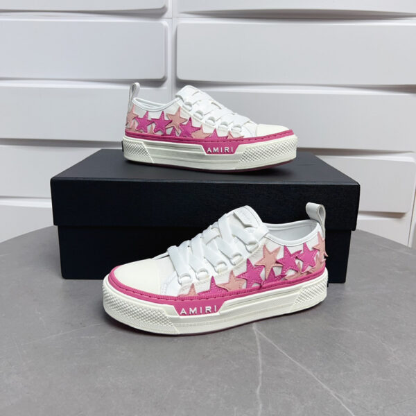 Amiri Star Court Low-Top Sneakers in Pink and White.