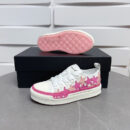 Amiri Star Court Low-Top Sneakers in Pink and White.