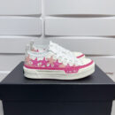 Amiri Star Court Low-Top Sneakers in Pink and White.