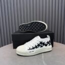 Amiri Stars Court Low-Top Sneakers in White with Black Stars