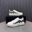 Amiri Stars Court Low-Top Sneakers in White with Black Stars