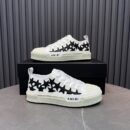 Amiri Stars Court Low-Top Sneakers in White with Black Stars