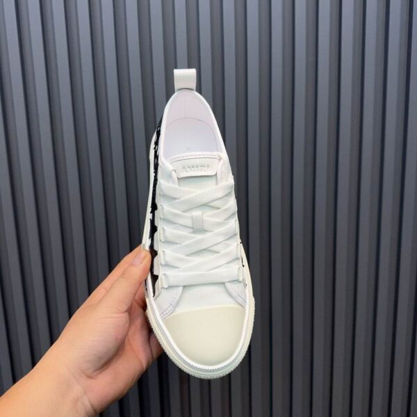 Amiri Stars Court Low-Top Sneakers in White with Black Stars - Image 3