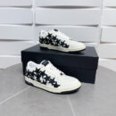 Amiri Stars Court Low-Top Sneakers in White with Black Stars.