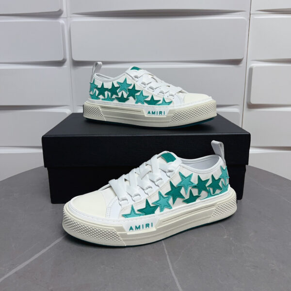 Amiri Stars Court Low-Top Sneakers in White with Green Stars.