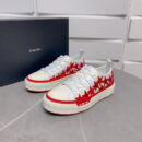 Amiri Stars Court Low-Top Sneakers in White with Red Stars.