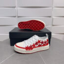 Amiri Stars Court Low-Top Sneakers in White with Red Stars.