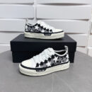 Amiri Stars Court Sneakers in White with White & Gray Stars.