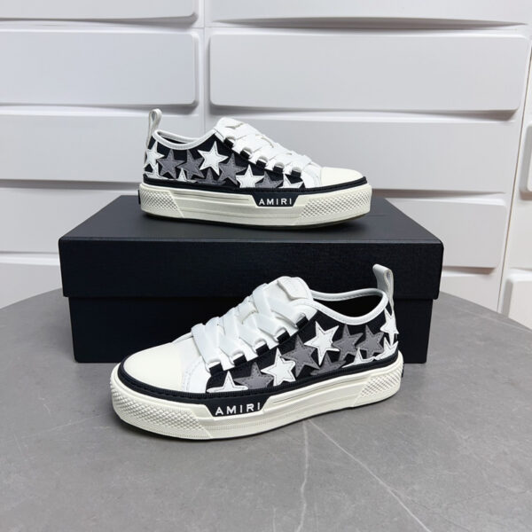 Amiri Stars Court Sneakers in White with White & Gray Stars.