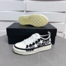 Amiri Stars Court Sneakers in White with White & Gray Stars.