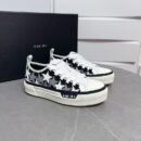 Amiri Stars Court Sneakers in White with White & Gray Stars.