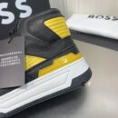 BOSS Black and Yellow High-Top Sneaker.