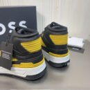 BOSS Black and Yellow High-Top Sneaker.