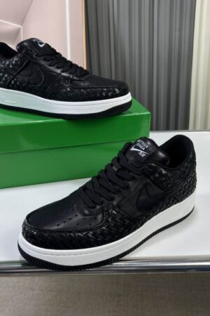 Bottega Veneta Black Woven Low-Top Sneaker with White Sole.