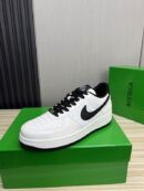 Bottega Veneta White Woven Low-Top Sneaker with Black Accents.