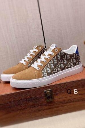 Dior Low-Top Sneaker in Tan/Brown, White and Gray Patterns.