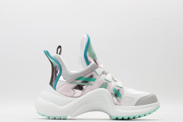 : A pair of black chunky athletic sneakers with brown monogram patterns on the toe and sides, black laces, a prominent black sculptural wavy sole, and a high ankle collar, displayed against a plain white background.