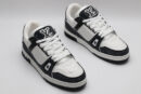 A single black and white Louis Vuitton LV Trainer sneaker, covered in glittering black crystal embellishments, with "VUITTON" written on the side strap