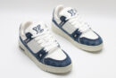 A single blue denim and white Louis Vuitton LV Trainer Low-Top Sneaker, showcasing its full design from a slight angle.