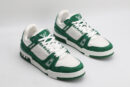 A pair of Louis Vuitton LV Trainer Low-Top Sneakers in green and white monogram canvas, viewed from an elevated angle, showcasing both shoes with green monogram canvas panels and white leather details.