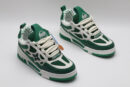 A single green and white Louis Vuitton LV Trainer sneaker, showcasing its vibrant color blocking, mesh panels, and robust sole.