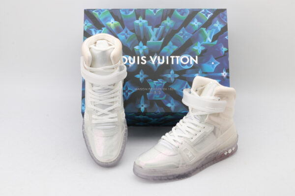 A pair of transparent white Louis Vuitton LV Trainer high-top sneakers with clear velcro straps and a chunky white sole