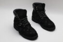 A single black Timberland x Louis Vuitton collaborative waterproof boot, featuring an all-over debossed Louis Vuitton monogram on suede, with silver eyelets and a black padded collar.
