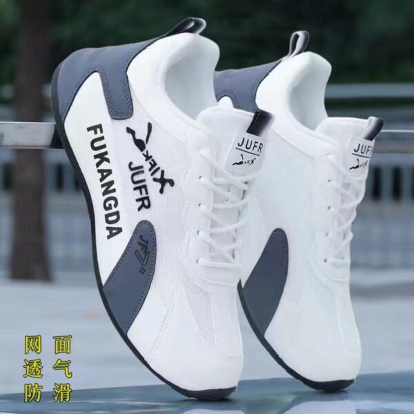 A pair of unisex casual sneakers in white with black and gray accents, displayed from a side angle.